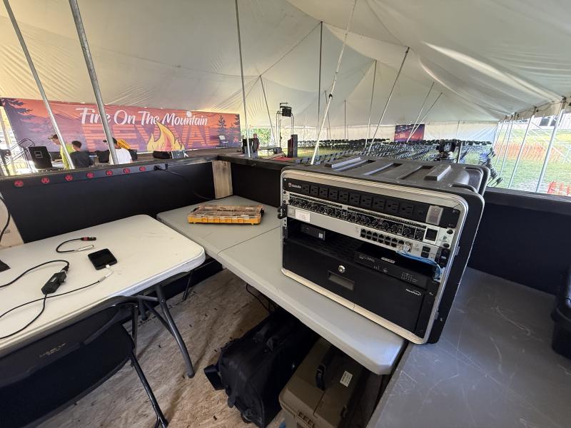 Photo of video rack and stage in the background